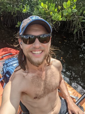 Took a slefie while kayaking in a canal I was exploring in sarasota